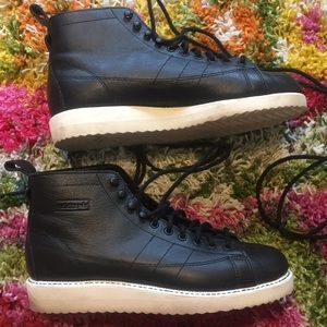 Lace up high top adidas with grommet detail